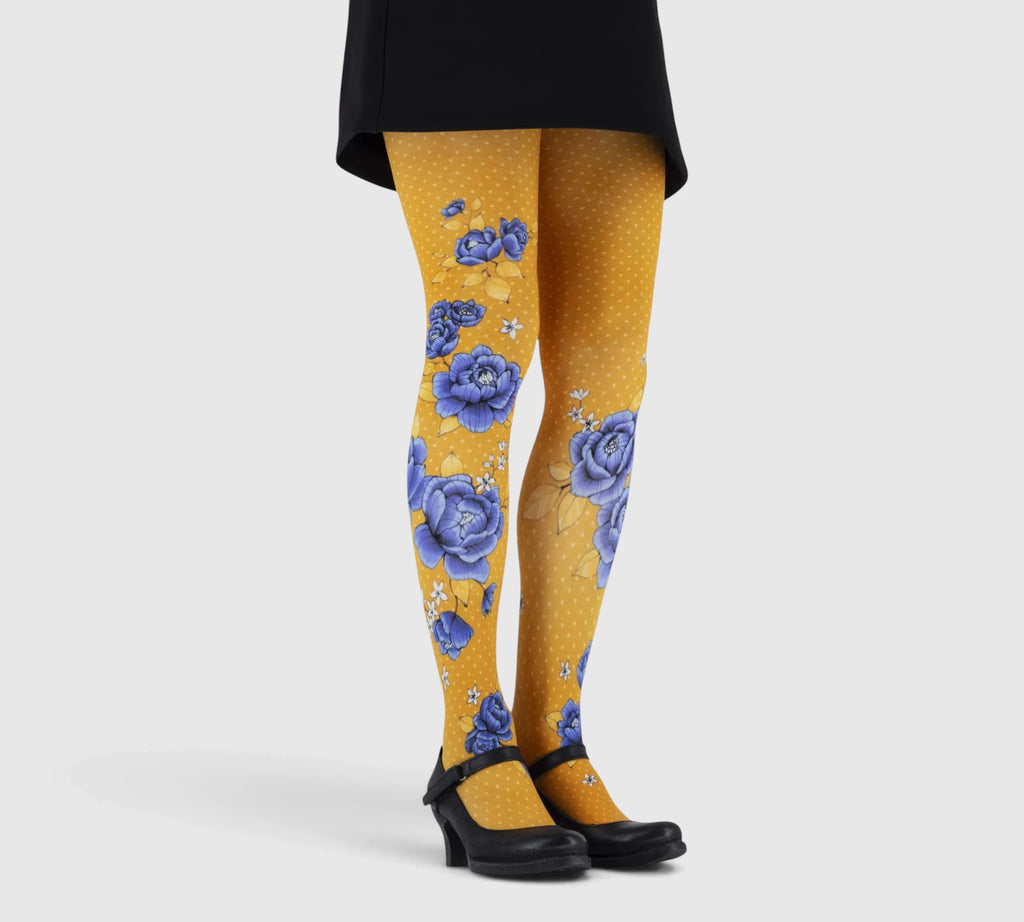 Collant fantaisie femme orange à fleurs bleues