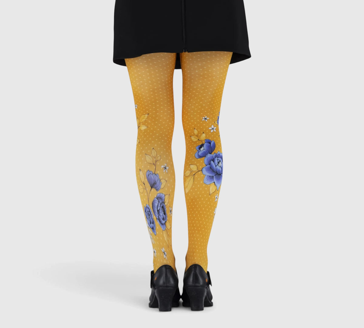 Collant fantaisie femme orange à fleurs bleues