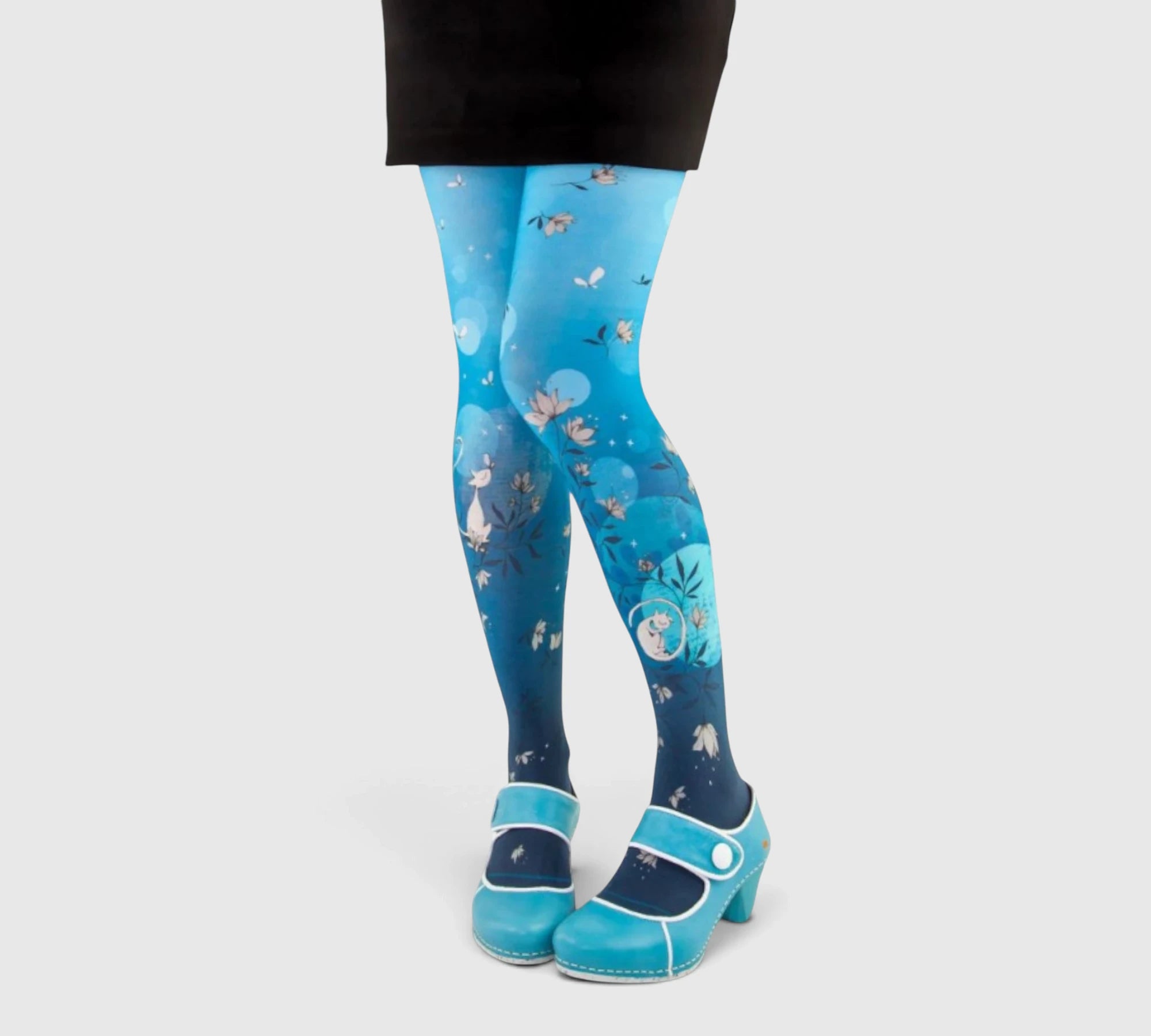 Collants bleus à motif chat et fleurs poétiques