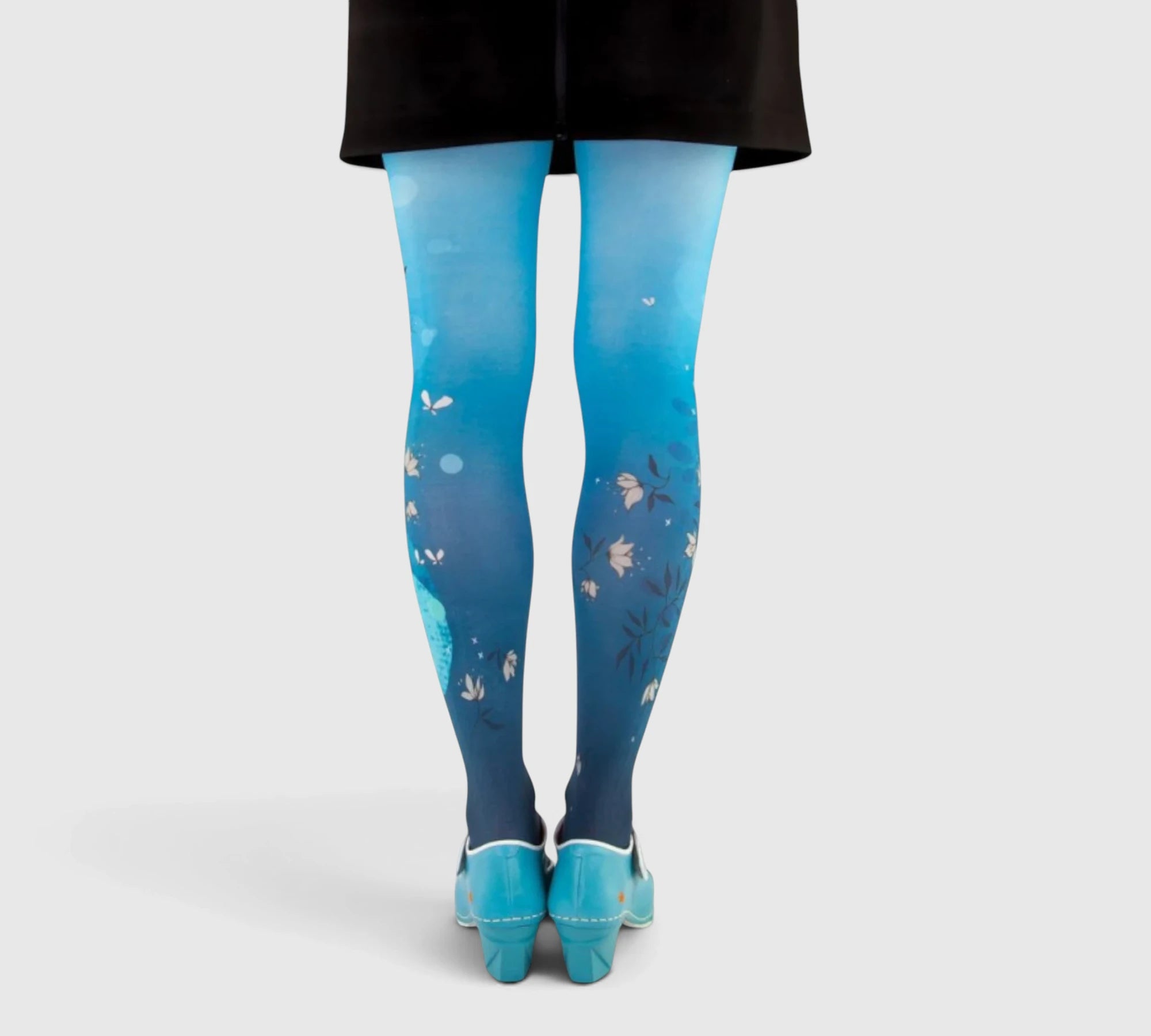Collants bleus à motif chat et fleurs poétiques