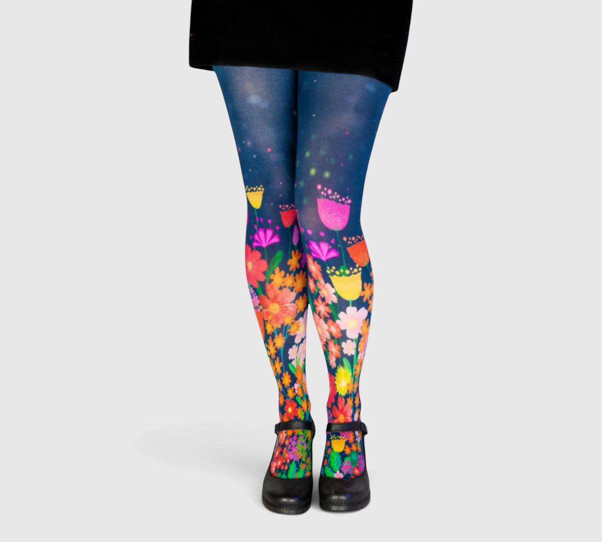 Collants bleus fantaisie motifs fleurs