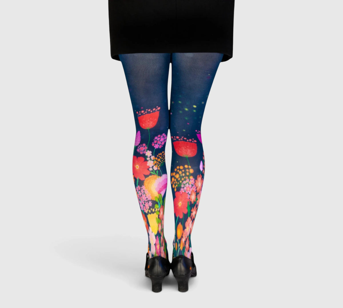 Collants bleus fantaisie motifs fleurs