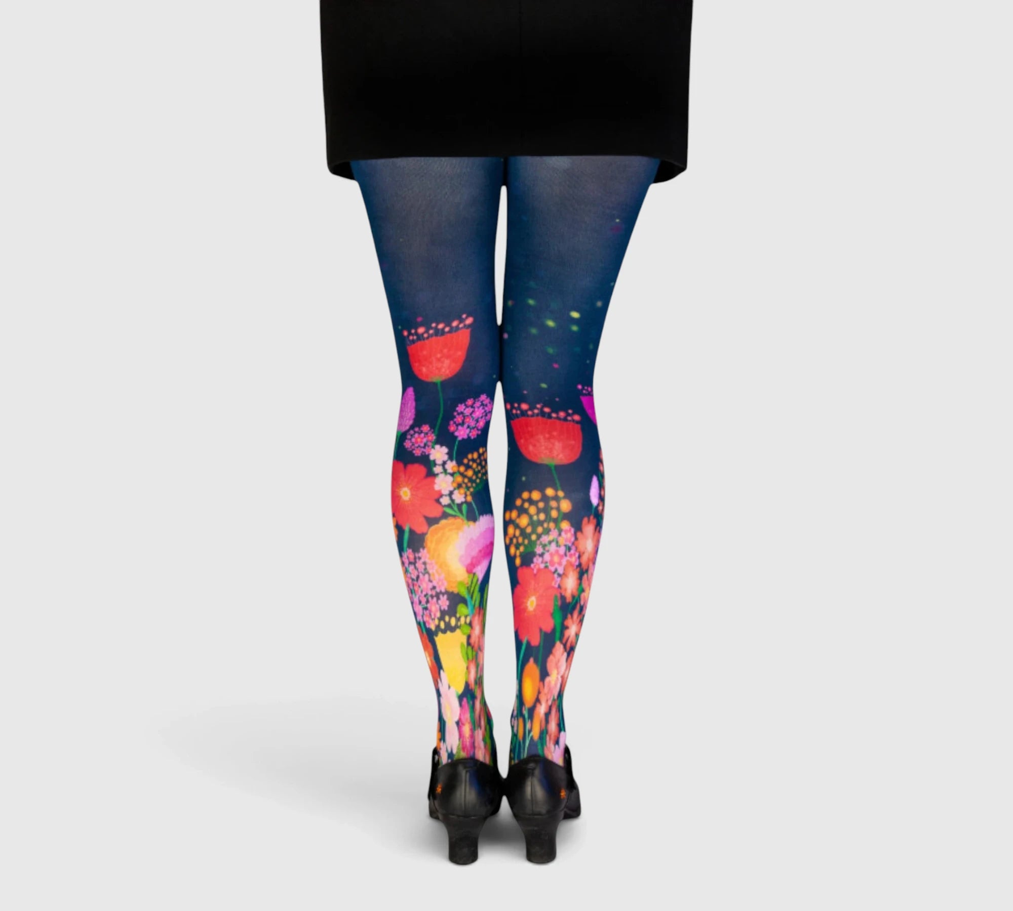 Collants bleus fantaisie motifs fleurs