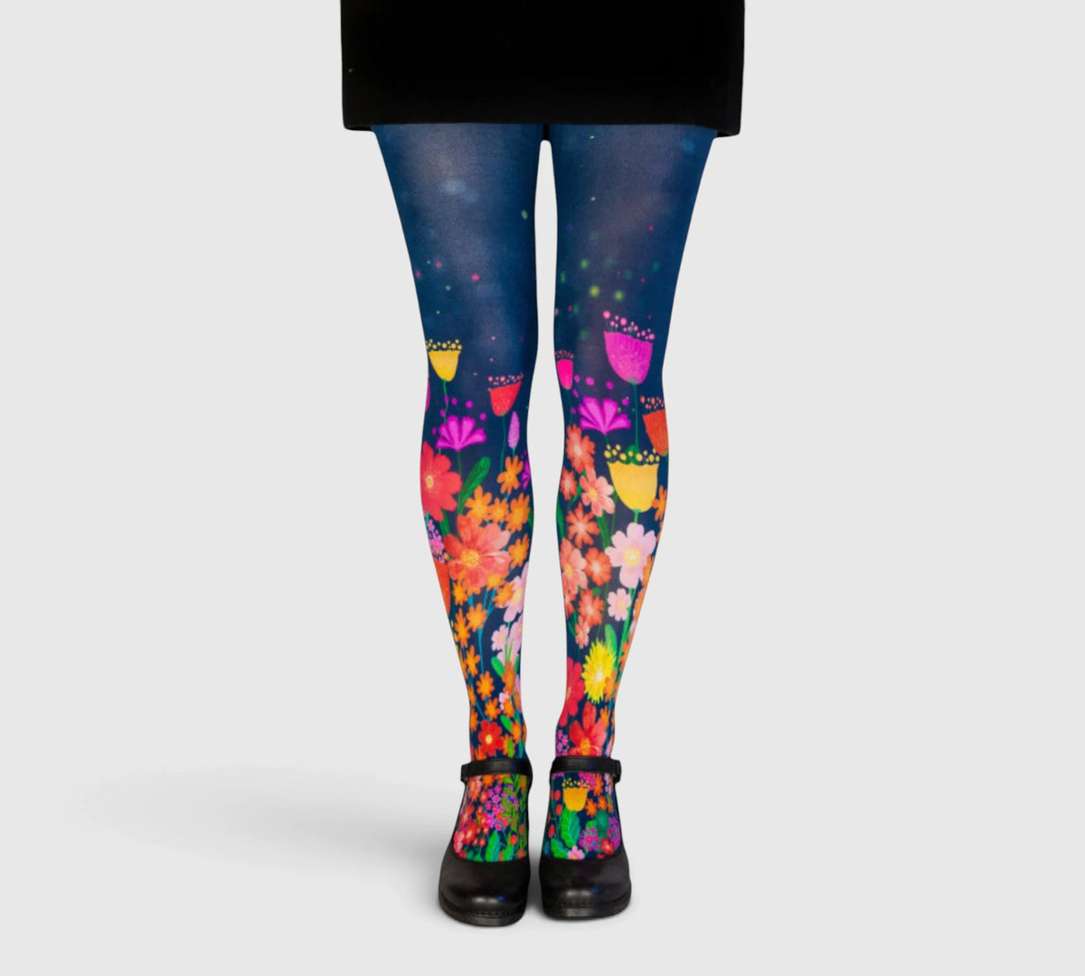 Collants bleus fantaisie motifs fleurs