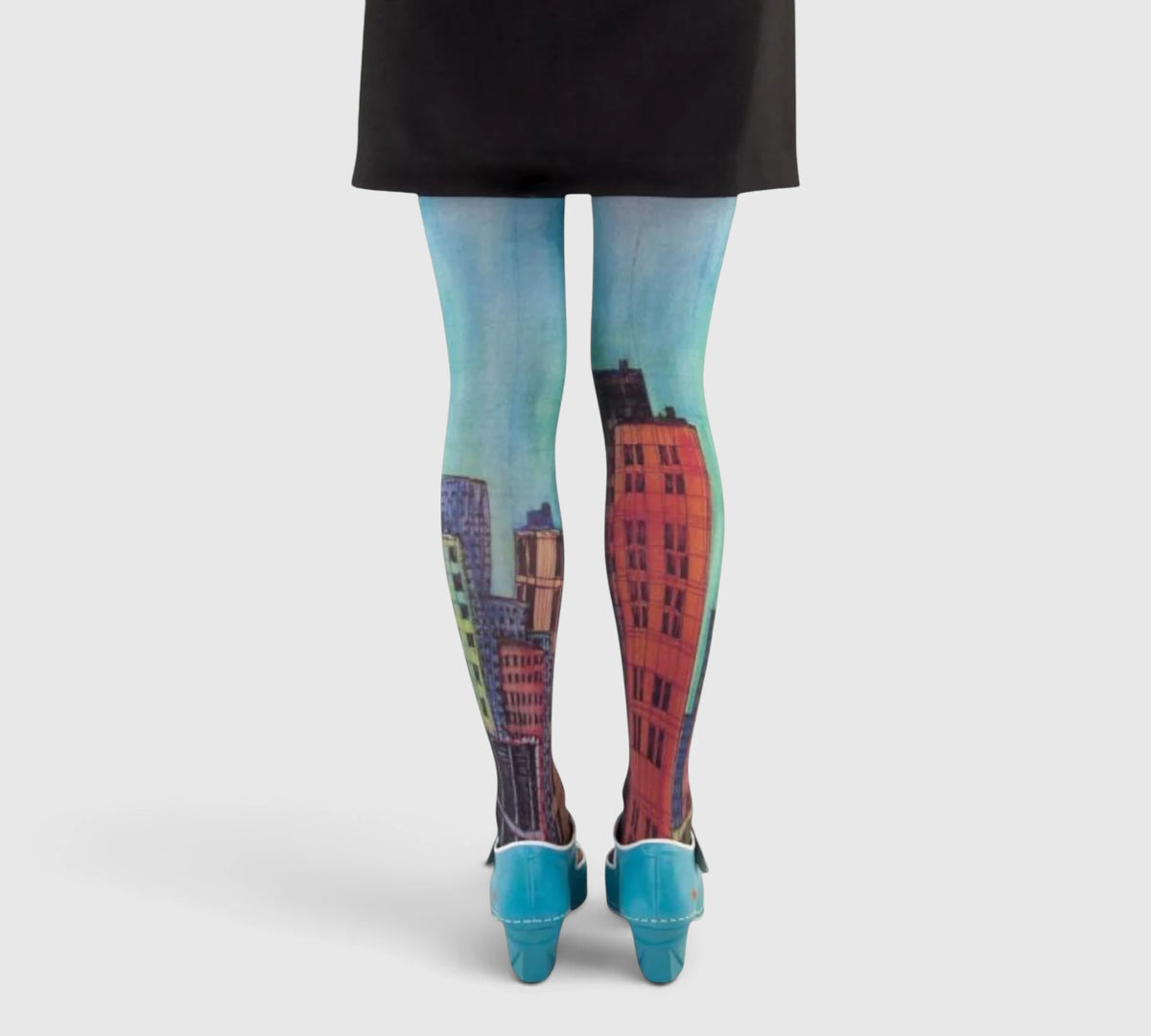 Collants bleus – gratte-ciel colorés design urbain
