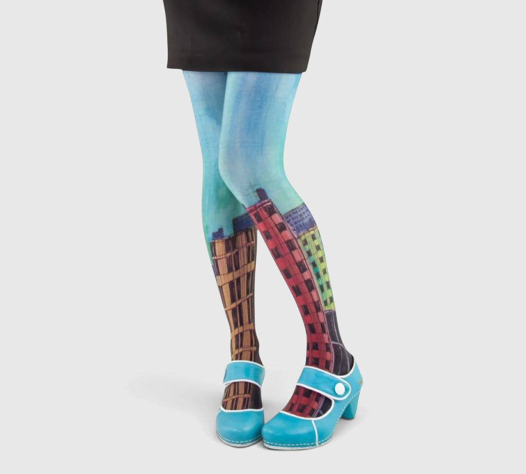 Collants bleus – gratte-ciel colorés design urbain