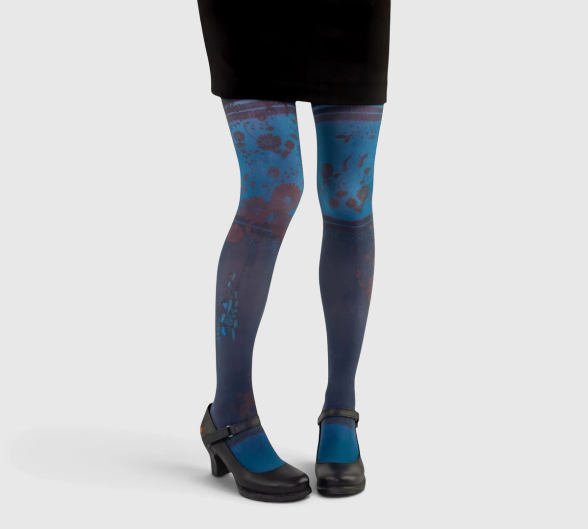 Collants fantaisie femme Atika – fond bleu nuit à motifs floraux