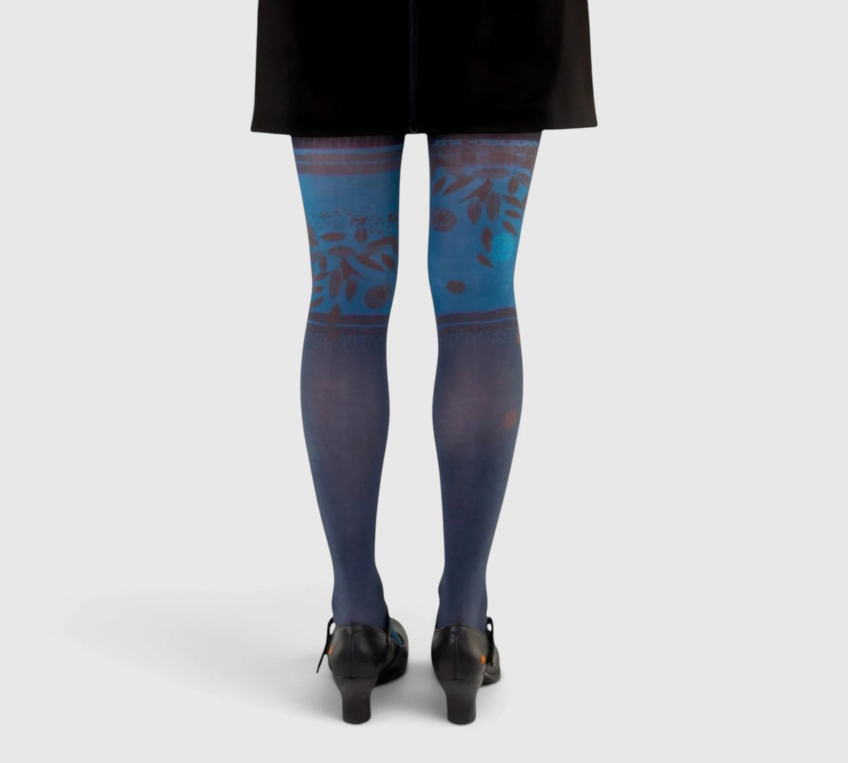 Collants fantaisie femme Atika – fond bleu nuit à motifs floraux