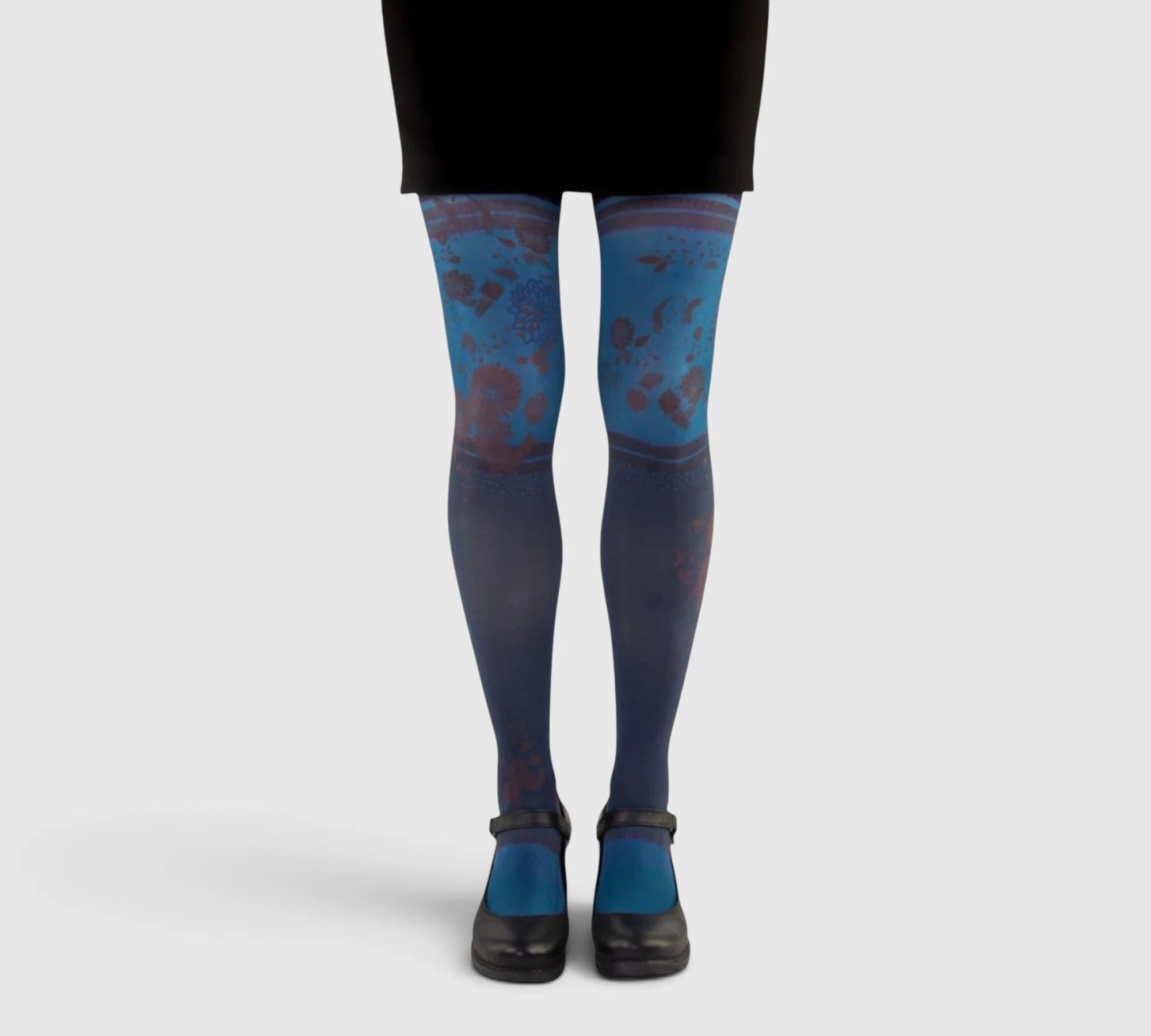 Collants fantaisie femme Atika – fond bleu nuit à motifs floraux