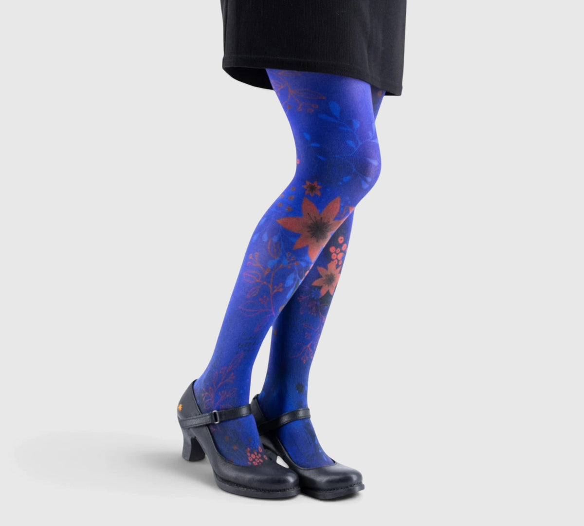 Collants Originaux et Résistants – Harmonie Florale sur Fond Bleu Profond