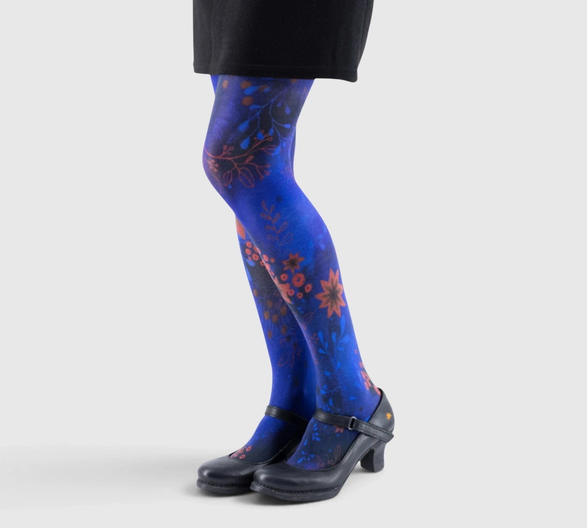 Collants Originaux et Résistants – Harmonie Florale sur Fond Bleu Profond