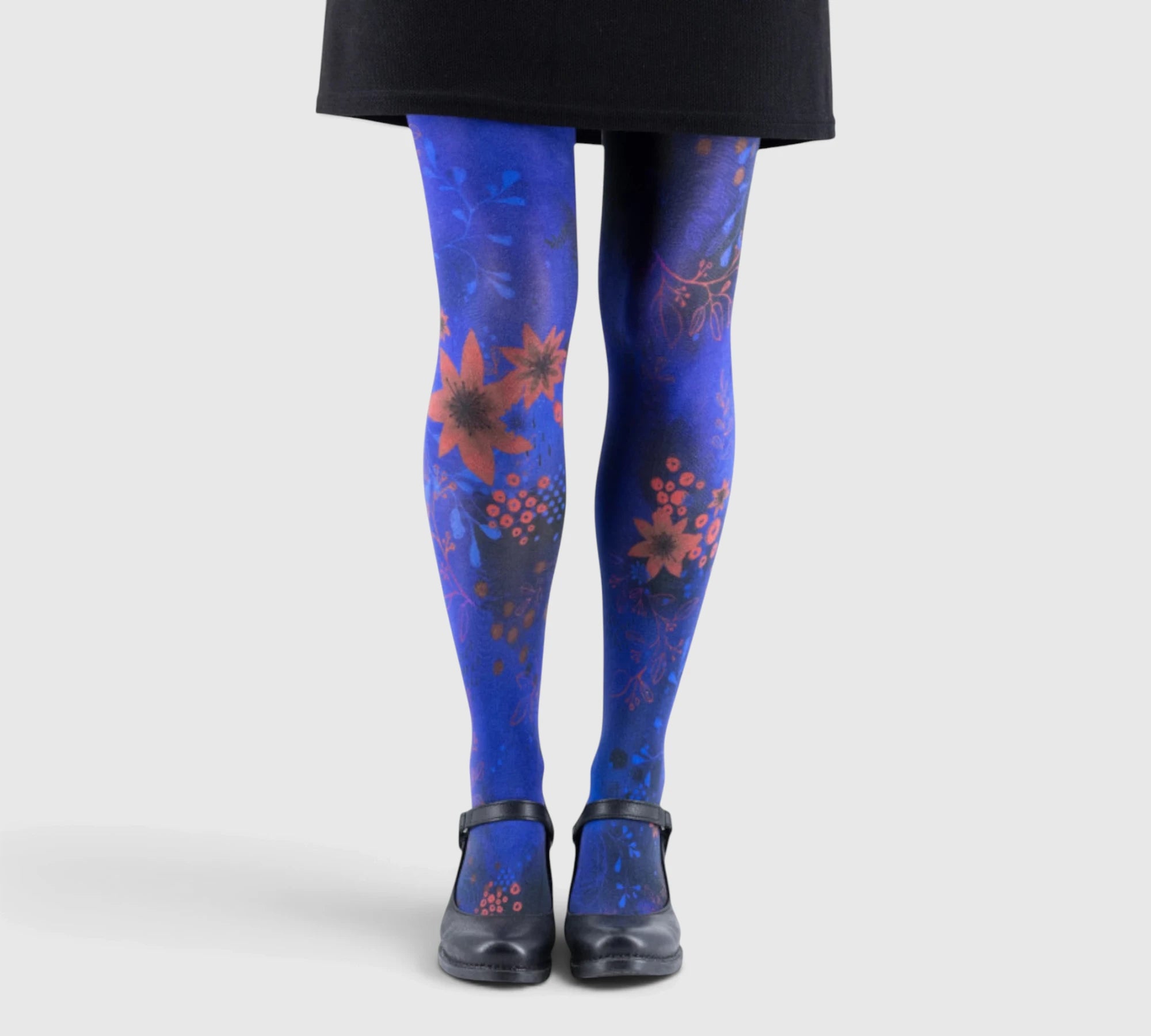 Collants Originaux et Résistants – Harmonie Florale sur Fond Bleu Profond