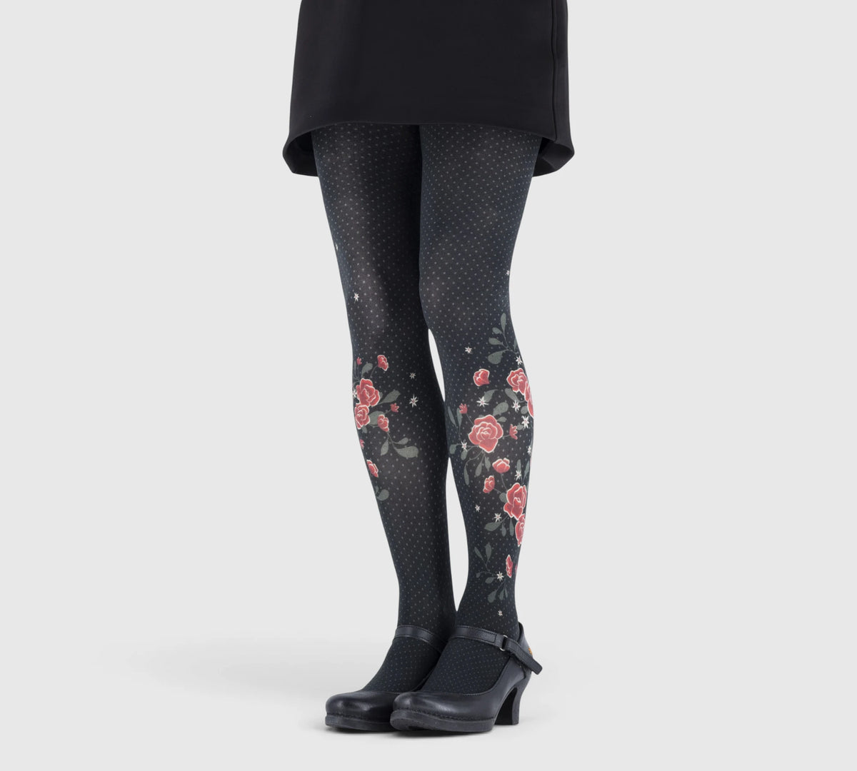 Collants fantaisie noirs à pois avec pivoines rouges