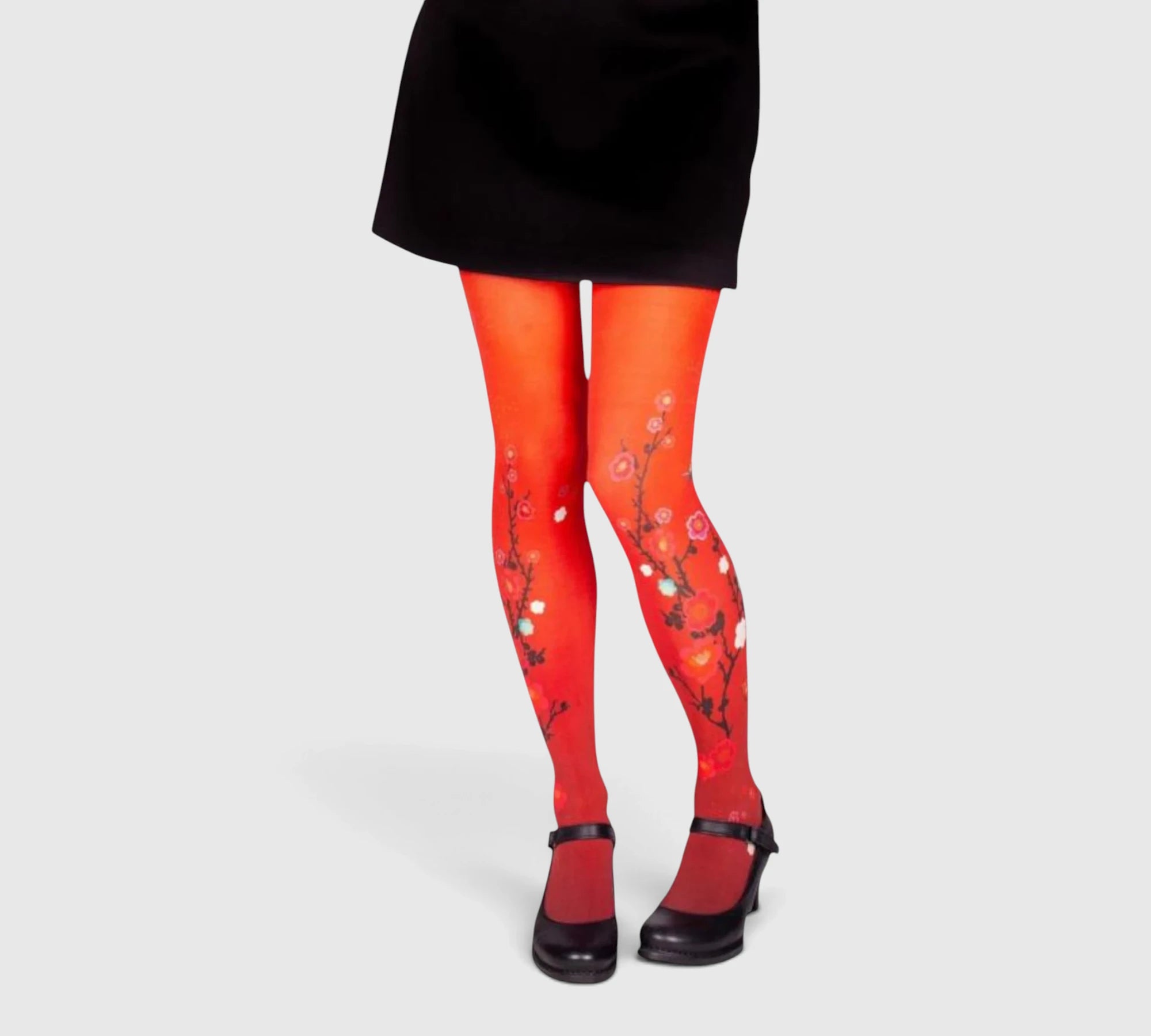 Collants rouges imprimés carpes