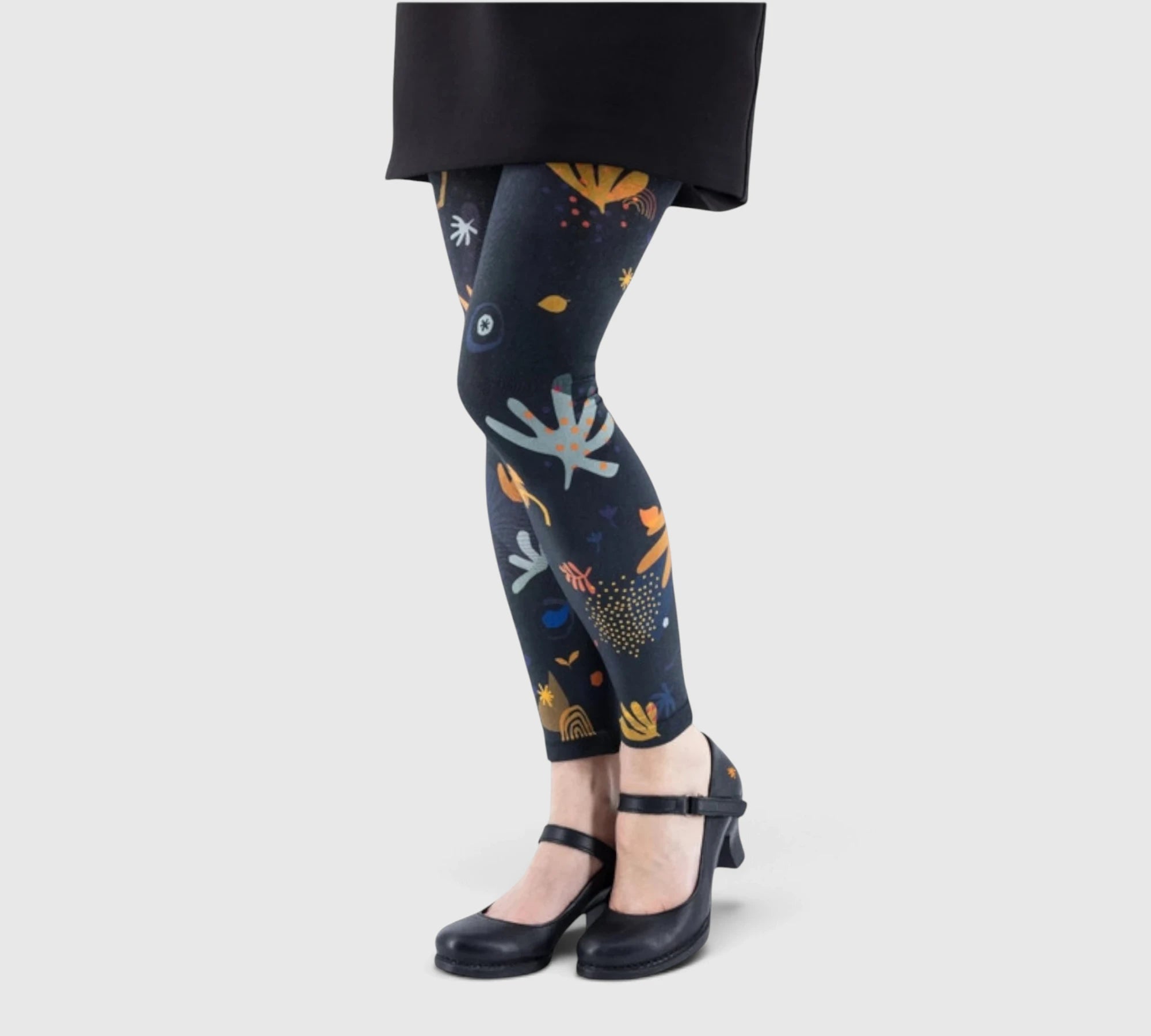 Leggings fantaisie : formes abstraites et couleurs chaudes