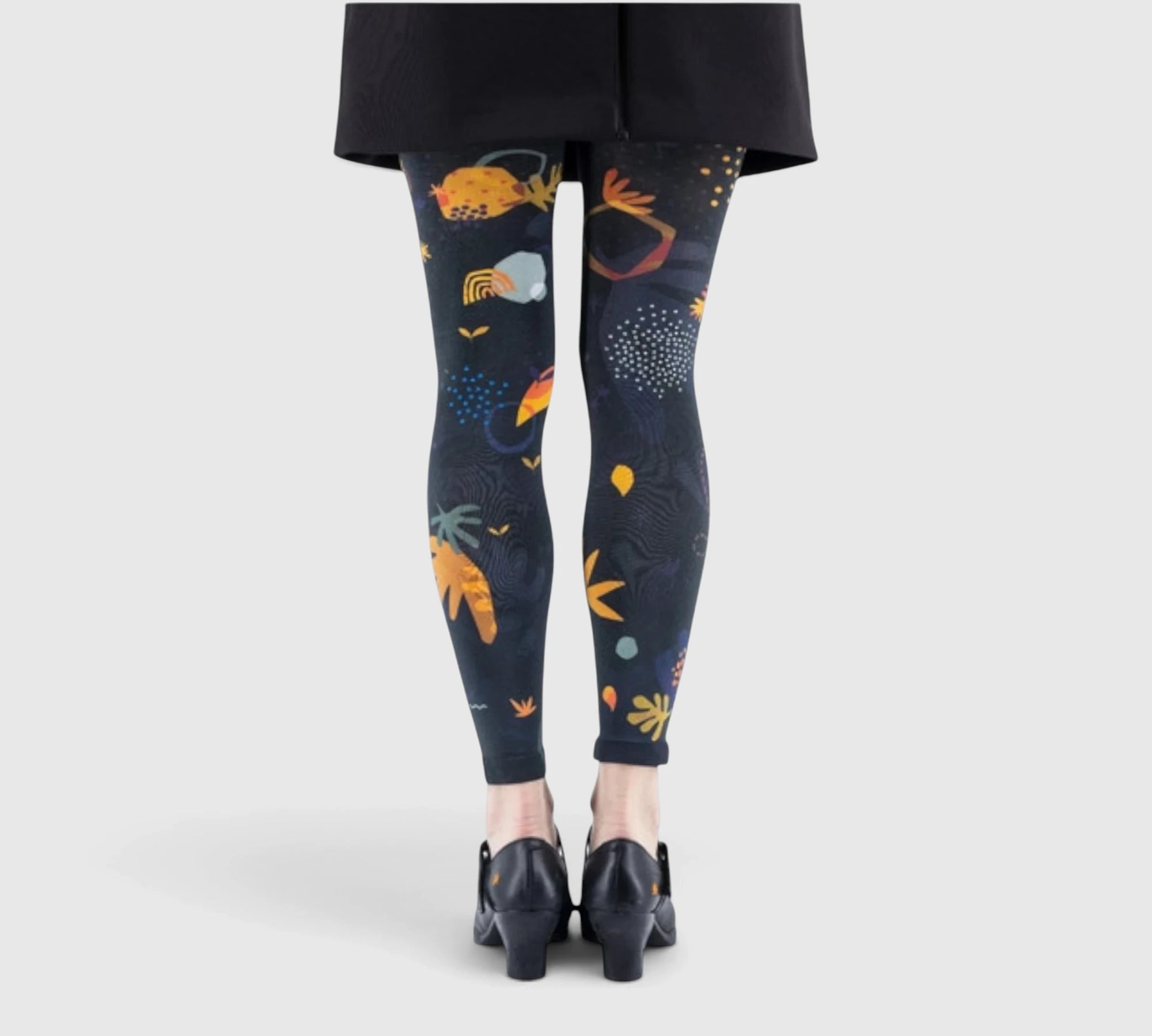 Leggings fantaisie : formes abstraites et couleurs chaudes