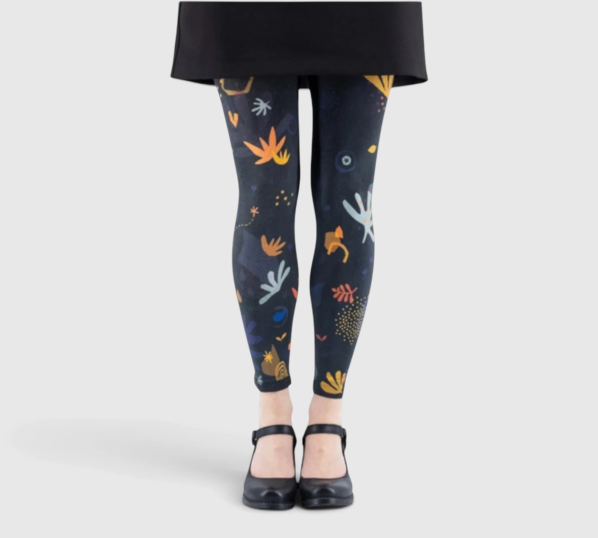 Leggings fantaisie : formes abstraites et couleurs chaudes